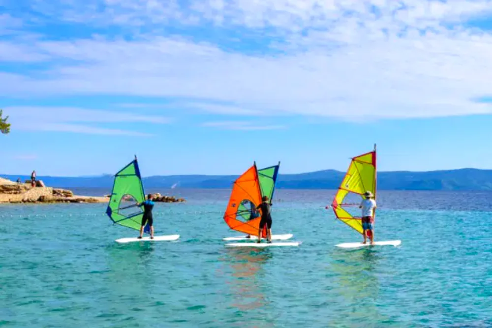 Windsurfing in the Maestral wind at Zlatni Rat, Bol, Brač Island